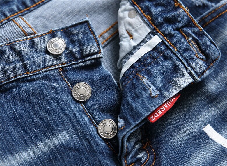 Ikon blå merke maling revet skrog vill personlighet jeans menn & #39 ;s nedre denim bukser lomme glidelås merking uformell Port