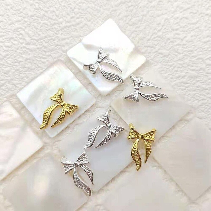 50 pezzi di ciondoli in lega d'oro e d'argento per unghie papillon farfalla 3D multi-forme accessori per unghie per ciondoli gioielli per chiodo arte giapponesi