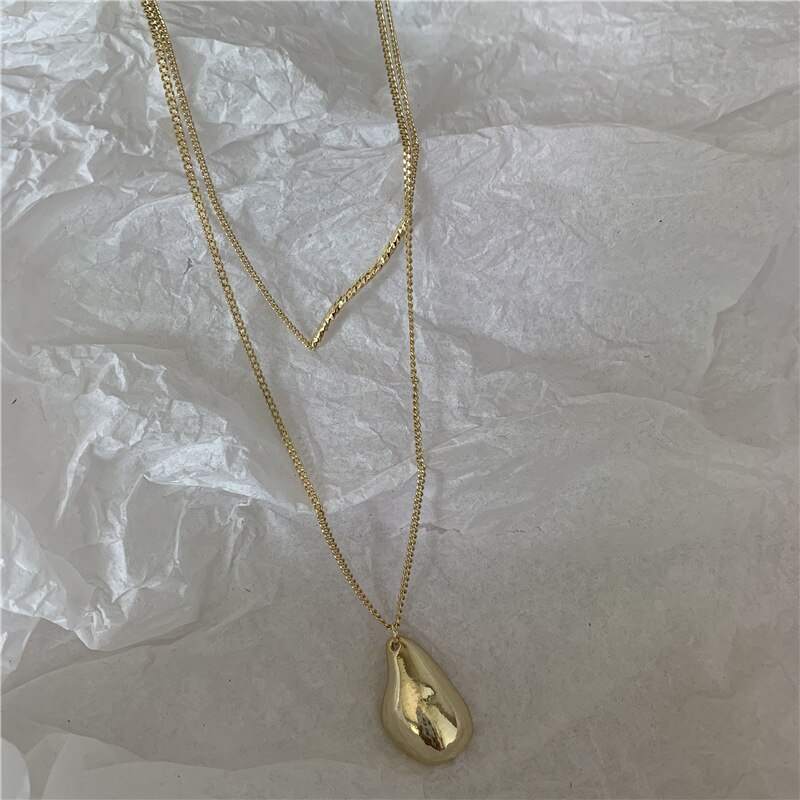 Huanzhi 2 stk/sæt vanddråbe uregelmæssige halskæder bølgeform guld halskæder til kvinder minimalistisk abstrakt halskæde smykker: Default Title