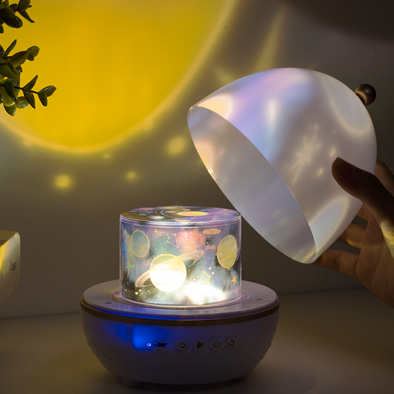 Lampada da notte proiettore universo cielo stellato rotante LED luce notturna altoparlante Bluetooth giocattoli musicali regalo educativo per bambini