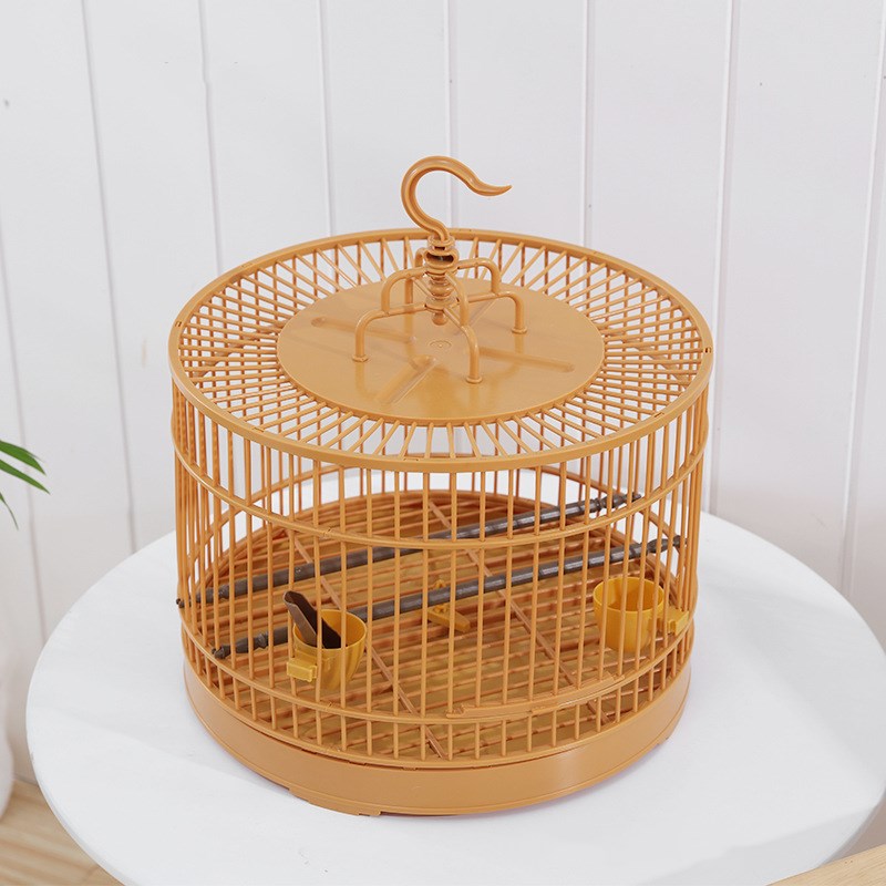 Jaula redonda de plástico para pájaros, jaula Retro Para loros con alimentador, desmontable y transpirable, suministros de cría