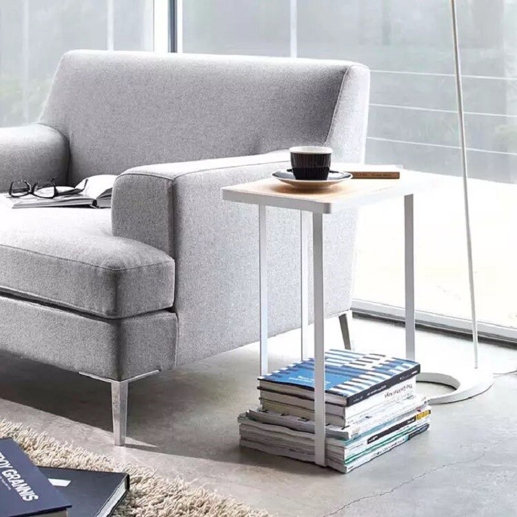 Several iron furniture storage stool beside sofa coffee cup notes storage table: white