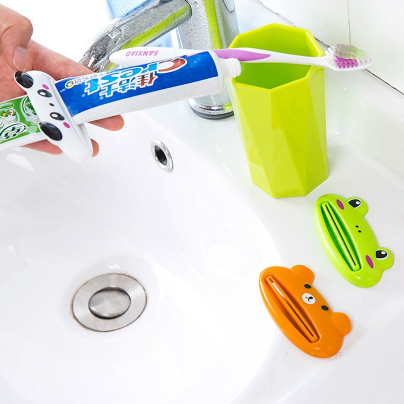 Badeværelse hjem tandpasta sød rør rullende holderpresser let tegneserie tandpasta dispenser tilbehør piggy / frø / panda