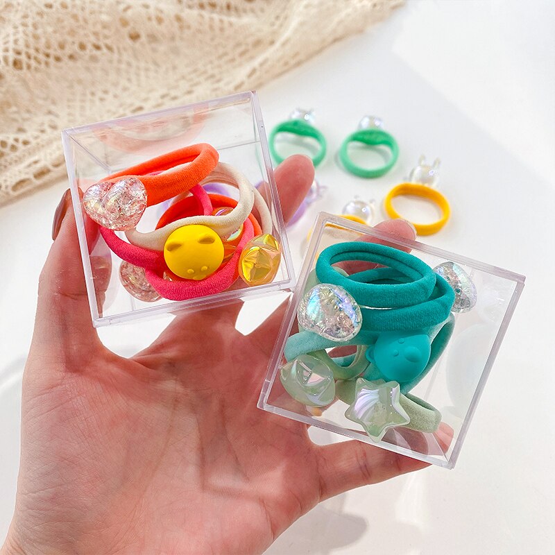 Boîte de chouchous en caoutchouc pour enfants, 5/8 pièces/boîte, bande de cheveux en forme de cœur, fleur, dessin animé, doux et brillant, accessoires pour cheveux