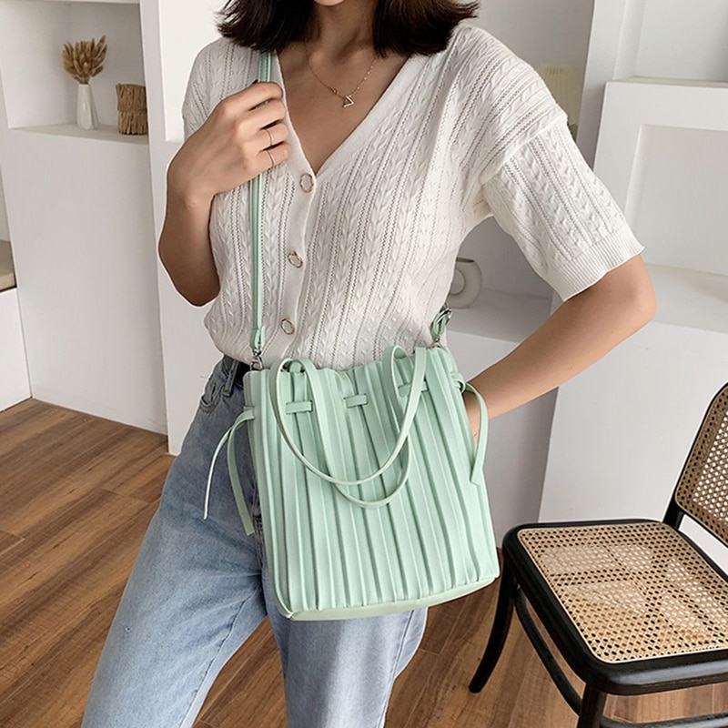 Trekkoord open emmer crossbody tassen voor vrouwen effen kleur geplooide schouder handtassen reis crossbody tas portemonnee