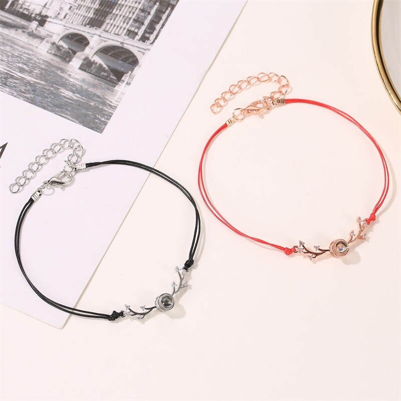 Wereldwijde Explosie EEN Herten heeft u Netto Rode Projectie Paar Antler Armband Creatieve 100 Talen I Love U