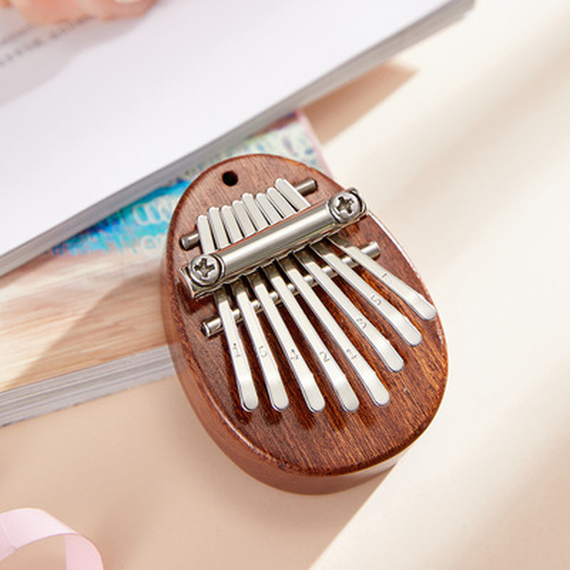Mini Kalimba à 8 touches, piano à pouces, piano à doigts exquis, Marimba portable, pendentif musical, clavier à 8 touches