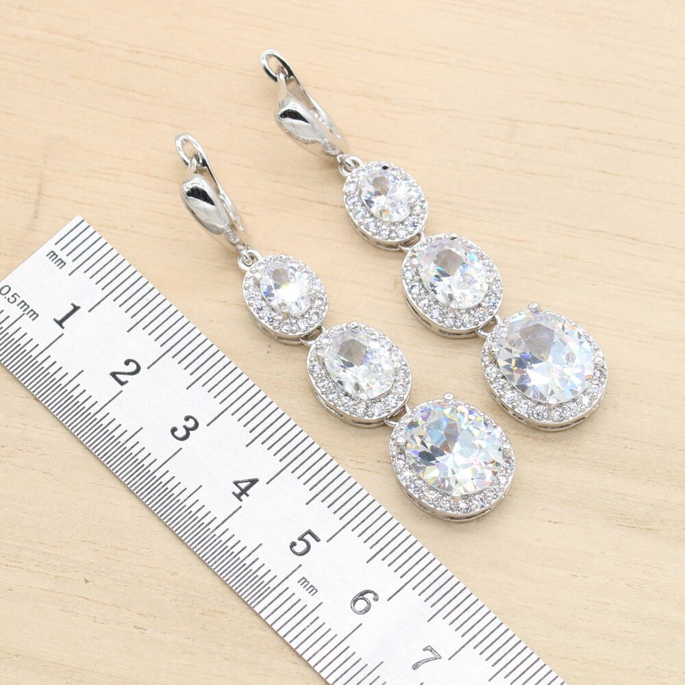 Set di gioielli classici Color argento con zirconi bianchi per bracciale da donna orecchini lunghi collana con ciondolo anello regalo