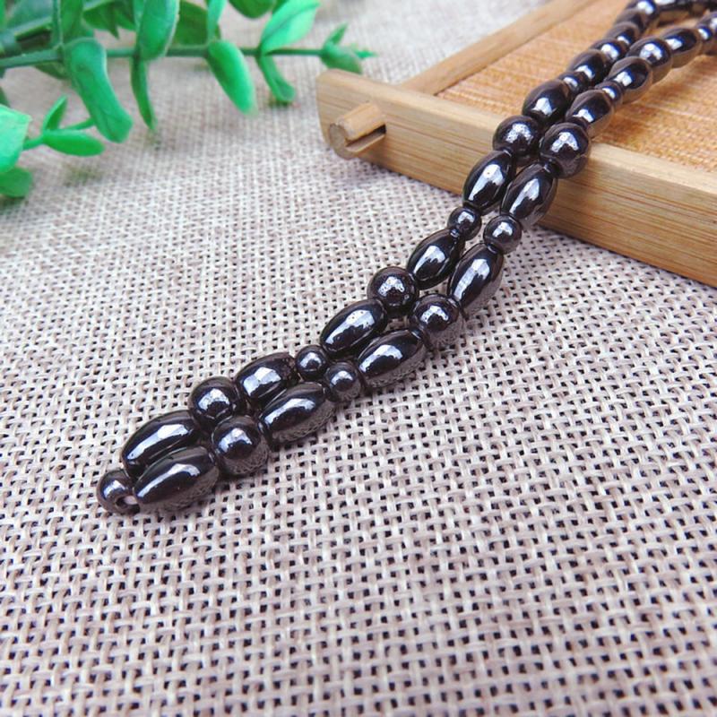 1 Pc Magnetico Naturale Nero Calcoli Biliari Terapia Magnetica Alla Caviglia Per Le Donne E Gli Uomini Elastico Cavigliere Regalo Dei Monili Nuovo 2020 Hot vendita