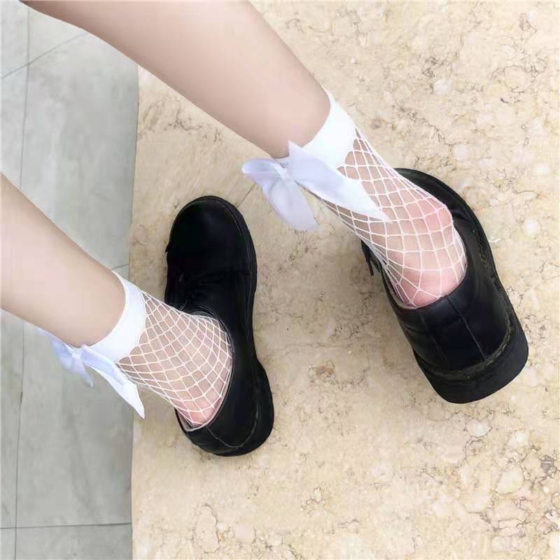 Calze da ragazza rete da pesca fiocco Lolita carino corto principessa dolce ragazza estate calze a rete calze donna maglia bambini