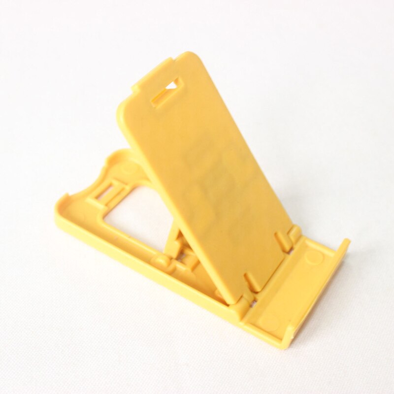 Mini Universal Foldable Phone Stand Plastic Desktop Mount Portable Folding Stand for iPhone Samsung Xiaomi Smartphone Stand: Yellow