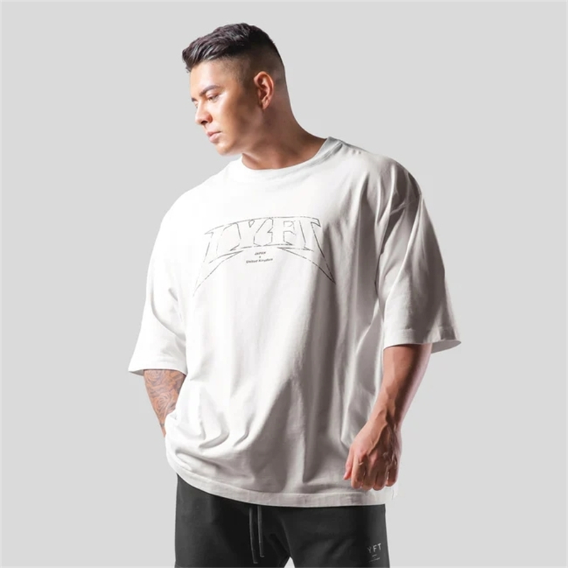 LYFT surdimensionné formation hommes T-Shirt lettres imprimer t-shirts pour hommes en vrac Sport rue vêtements décontractés t-shirts hauts: M / WHITE