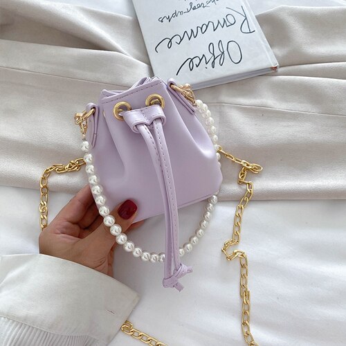 Dames mini emmertas parel handtas pu leer effen kleur ketting schoudertassen kleine schattige dames crossbody handtas: Paars