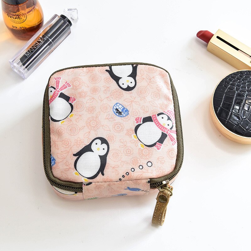 Kvinders hygiejnebind kosmetikpose opbevaringspose stor kapacitet rejse sød enkel japansk sanitets lynlås taske arrangør: Lille pingvin