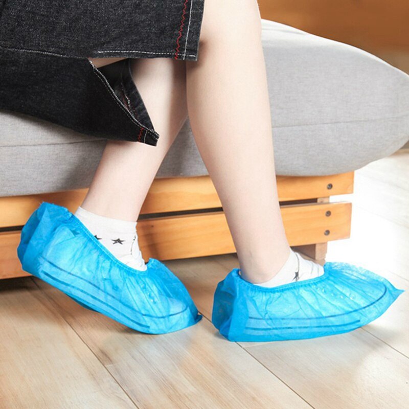 100 st förtjocka non-woven elastiskt skoskydd hem inomhus halkskydd överkläder student engångs dammtät fotskydd