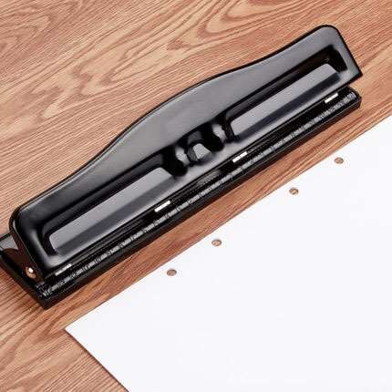 Hole puncher stationery binding puncher student manual loose-leaf paper manual puncher round hole three hole four hole puncher: Four-hole puncher