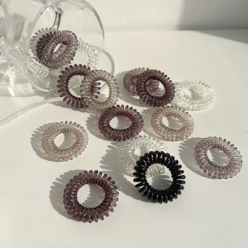 Gomas elásticas para el pelo para mujer, Niña y niño, cintas de goma transparentes en espiral, accesorios para el pelo, 9 unids/lote por caja