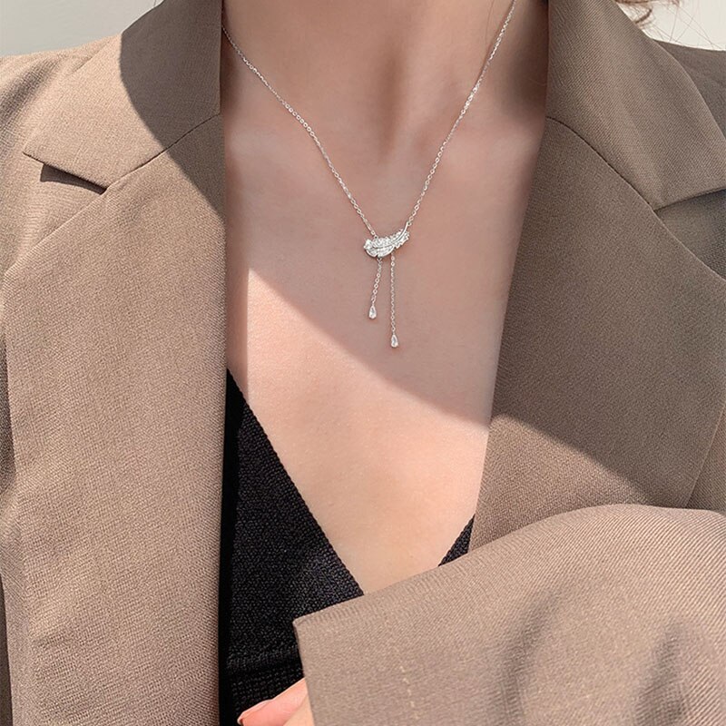 ANENJERY-collar de plumas de circonia cúbica brillante para mujer, Color plateado, collar de borla larga y delicada, S-N732