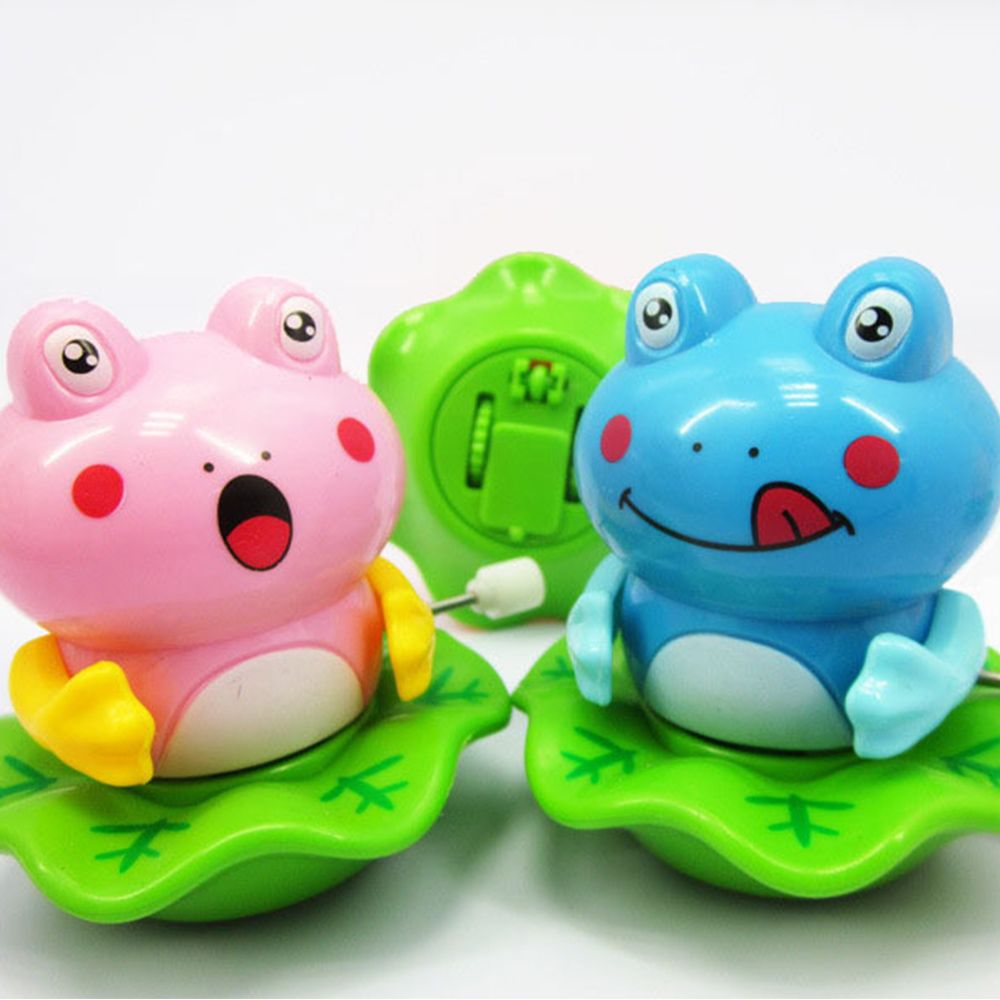 Dejlig plastik frø form baby børn urværk legetøj afvikle dans legetøj tilfældig farve afvikle legetøj