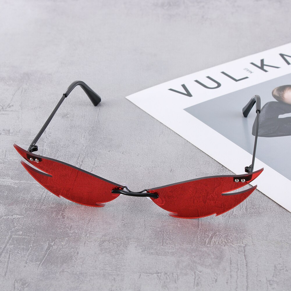 Nowy ogień płomień okulary mężczyźni kobiety Rimless Wave UV 400 luksusowe trendy Streetwear kolarstwo akcesoria zewnętrzne: B C04