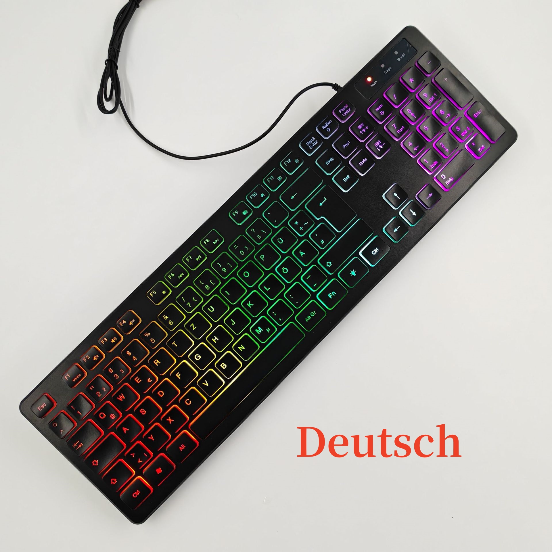 Teclado en español con la Ñ Teclado ruso, árabe, francés, alemán, inglés Ratón 100 % Retroiluminación arcoíris Letras translúcidas ISO 105 teclas Teclas de acceso directo multimedia W66