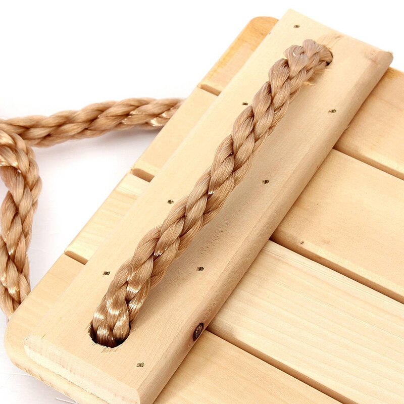 Adults and children swinging swings swinging wooden swing with rope