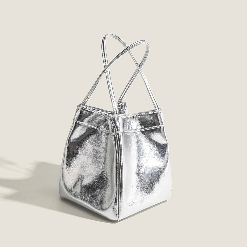 Zilveren bucket bag voor dames 2024 modieuze en eenvoudige lunchbox tas, niche westerse stijl textuur draagbare kleine tas: Zilver