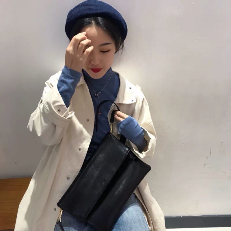 Korea dongdaemun ins kvindelig clutch taske vild simpel skuldertaske chic diagonal cross håndtaske: Sort