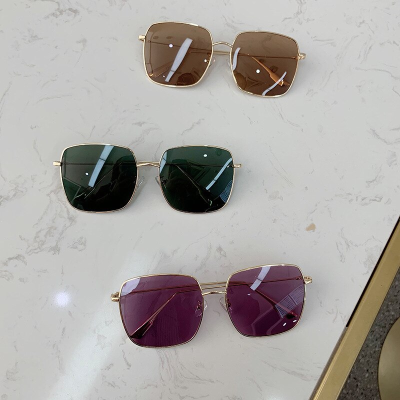 Ronde heren zonnebril met groot montuur en grote lenzen voor dames