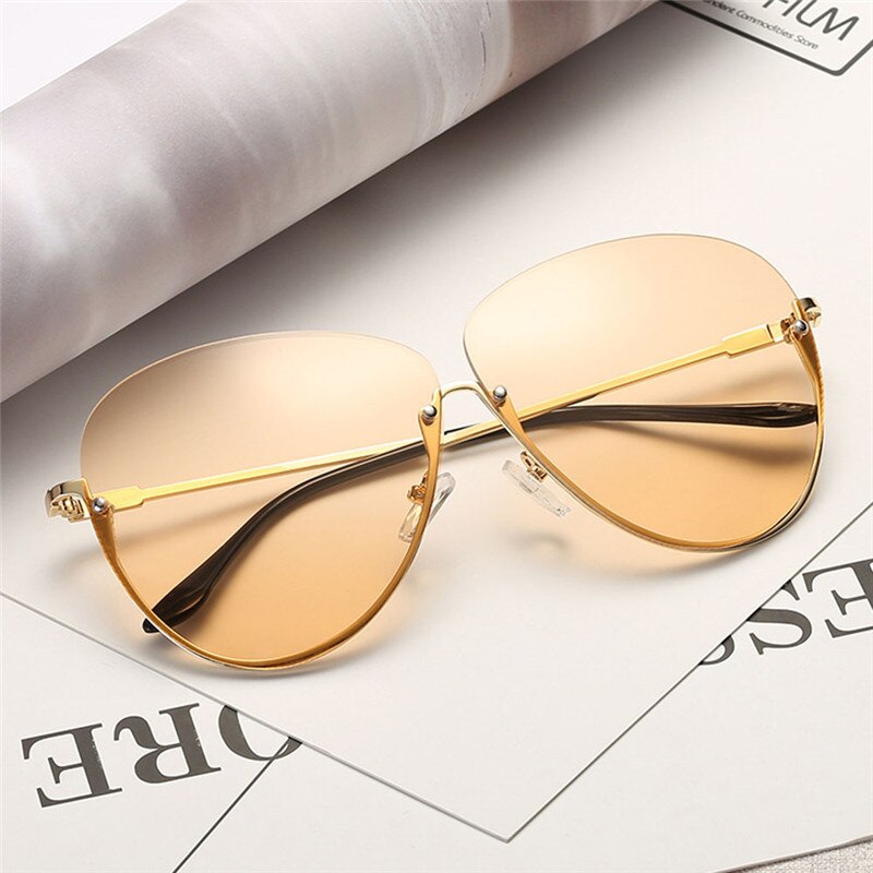 Kantløse cat eye damesolbriller trendy gennemsigtige solbriller damer gennemsigtige store metal guldkant kørebriller: 06