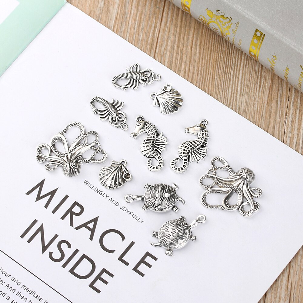 Neue Nette 56 teile/satz Groß Mixed Tibetischen Silber Charme Ozean Anhänger Perlen DIY Erkenntnisse Viele Schmuck Dekoration Zubehör