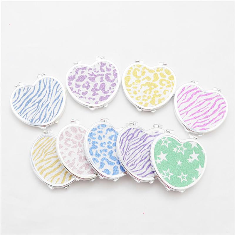 Mini poche en forme de coeur maquillage miroir cosmétique Compact miroirs Portable Double côtés maquillage miroir pour les femmes (couleur aléatoire)