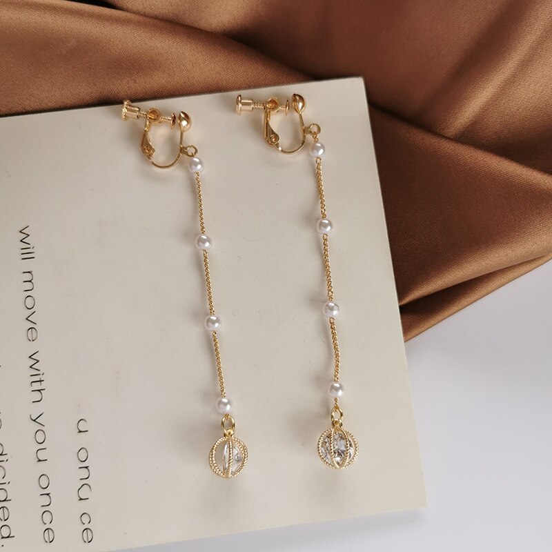 Corée Style fée longue perle gland Zircon pince sur boucles d'oreilles sans trou tempérament Simple brillant strass boule creuse boucles d'oreilles: clip on earrings