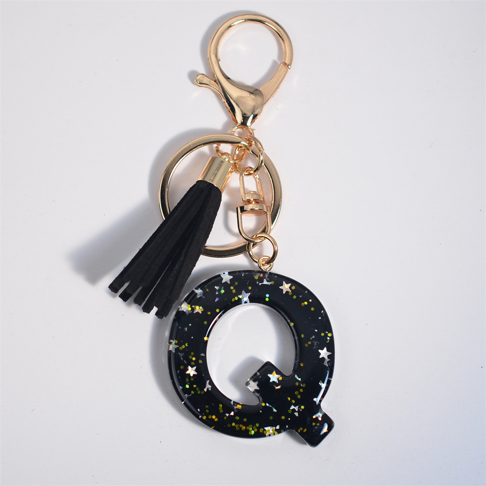 Schwarze Initialen A-Z Schlüsselanhänger Glitzer Stern Pailletten Harz Buchstaben Schlüsselanhänger mit Quaste für Frauen Tasche Ornamente Charm Autoschlüsselhalter: TRANSPARENT