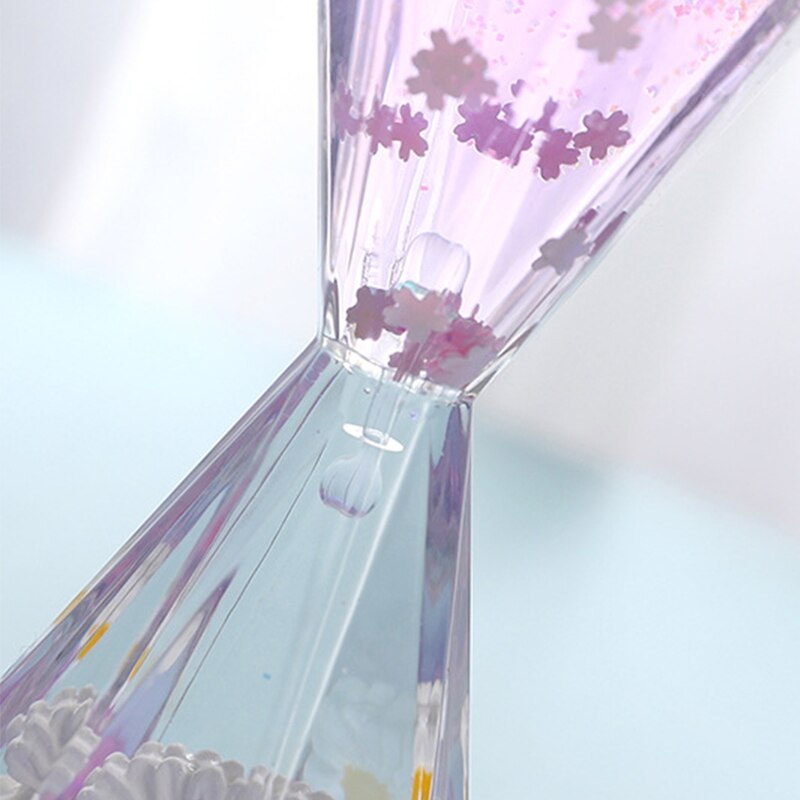 Diamentowy w kształcie płynnego ruchu Bubbler regulator czasowy stokrotka pływający olej klepsydra zabawka na biurko