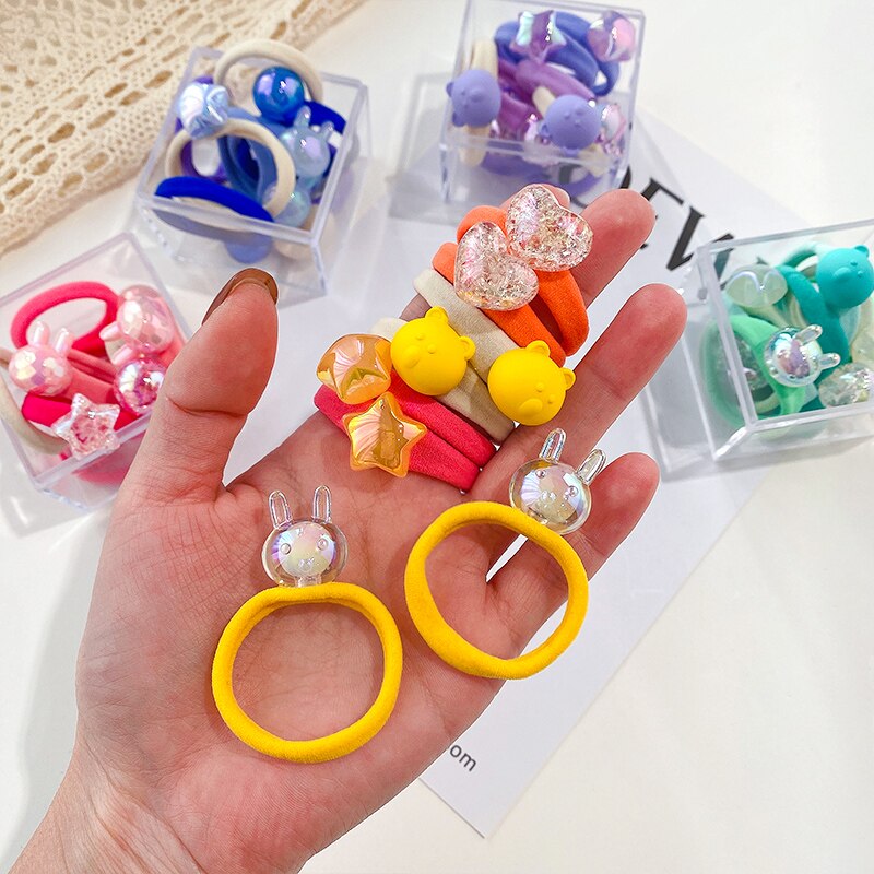 Boîte de chouchous en caoutchouc pour enfants, 5/8 pièces/boîte, bande de cheveux en forme de cœur, fleur, dessin animé, doux et brillant, accessoires pour cheveux