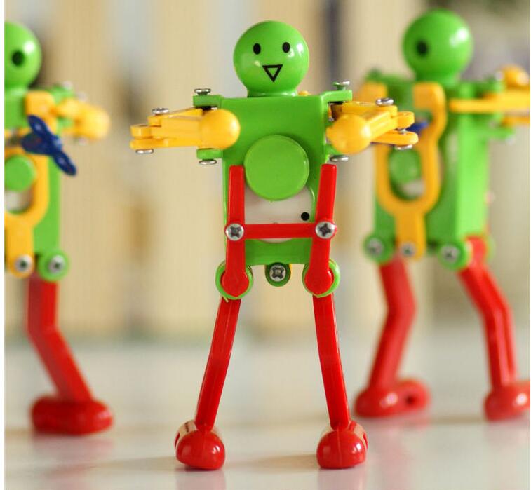 Dus Coll! 1 stks Clockwork Spring Wind Up Dansende Robot Speelgoed Kinderen Kids