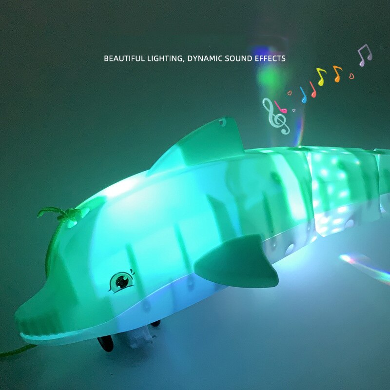 Correa de juguete eléctrica con forma de delfín para niños, Juguete musical ligero y Juguete Pequeño con música, juguete Universal para niños
