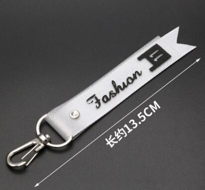 Engelska brev band lanyard mobiltelefon nyckelring hänge kläder byxor vilda dragkedja huvud tillbehör