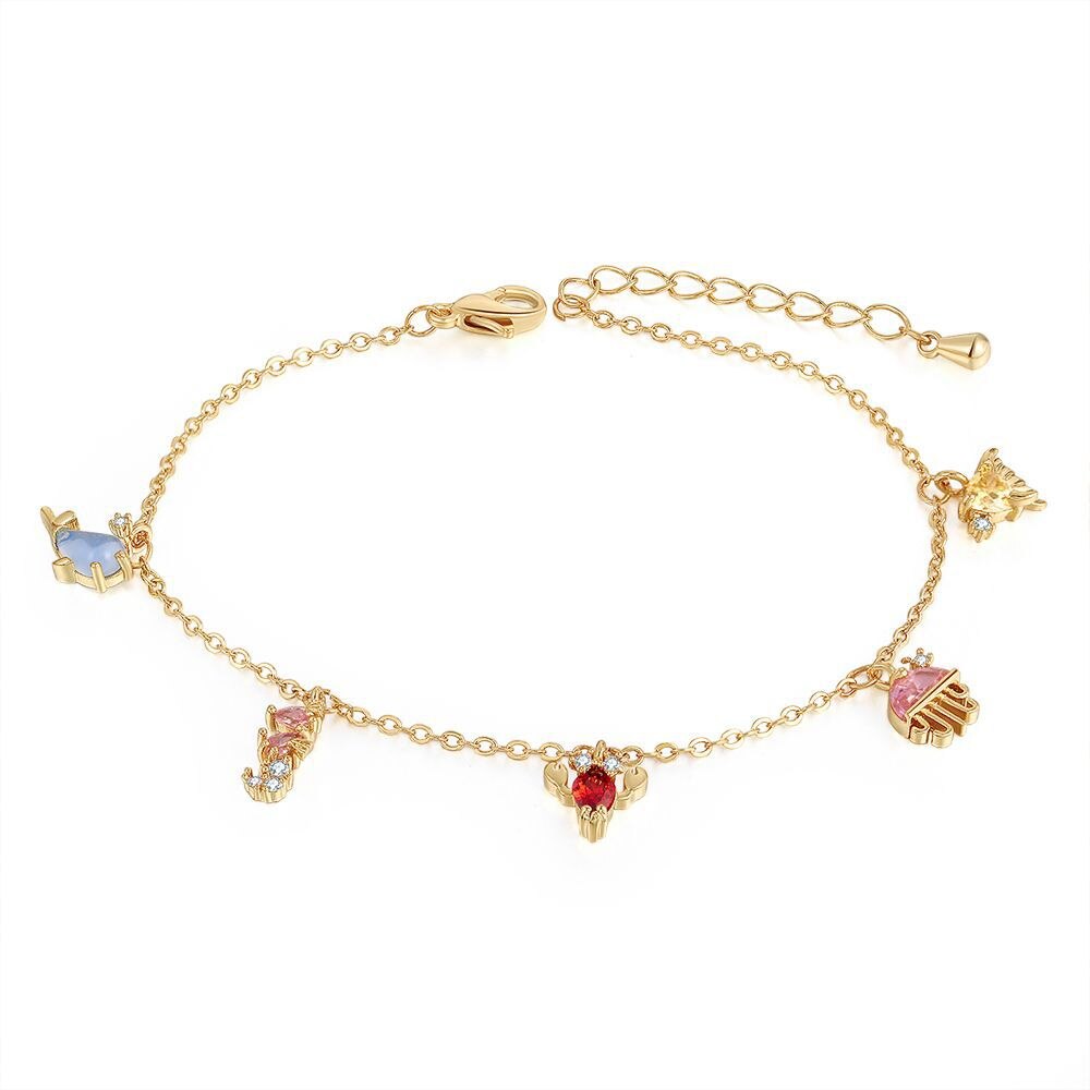 18k vergoldete fußkettchen mit exquisiten kleinen anhängern in form von meerestieren – schlichter, sommerlicher boho-schmuck für damen.: B