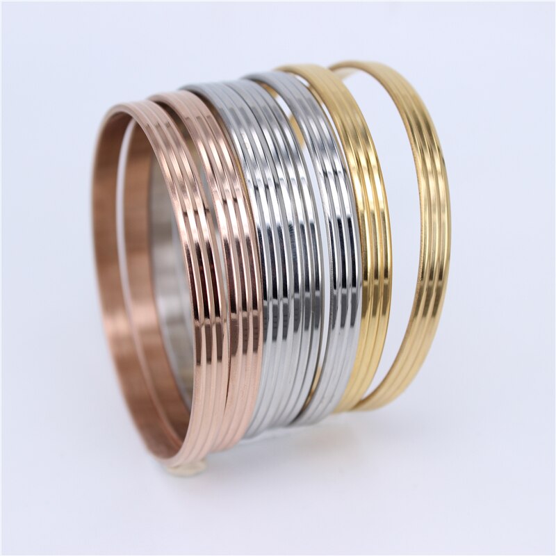 6mm de large trois lignes 3 couleur 70cm de diamètre en acier inoxydable 7 pièces/ensemble combinaison bracelets femmes accessoires LH476: Silver color 7pcs