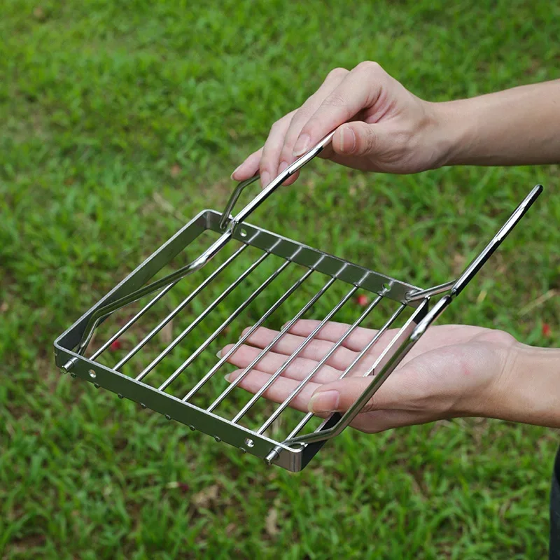 Campinggrill med fällbara ben -304 rostfria grillgaller för gasspis - ultralätt lägereldsställ - bärbart grillgaller