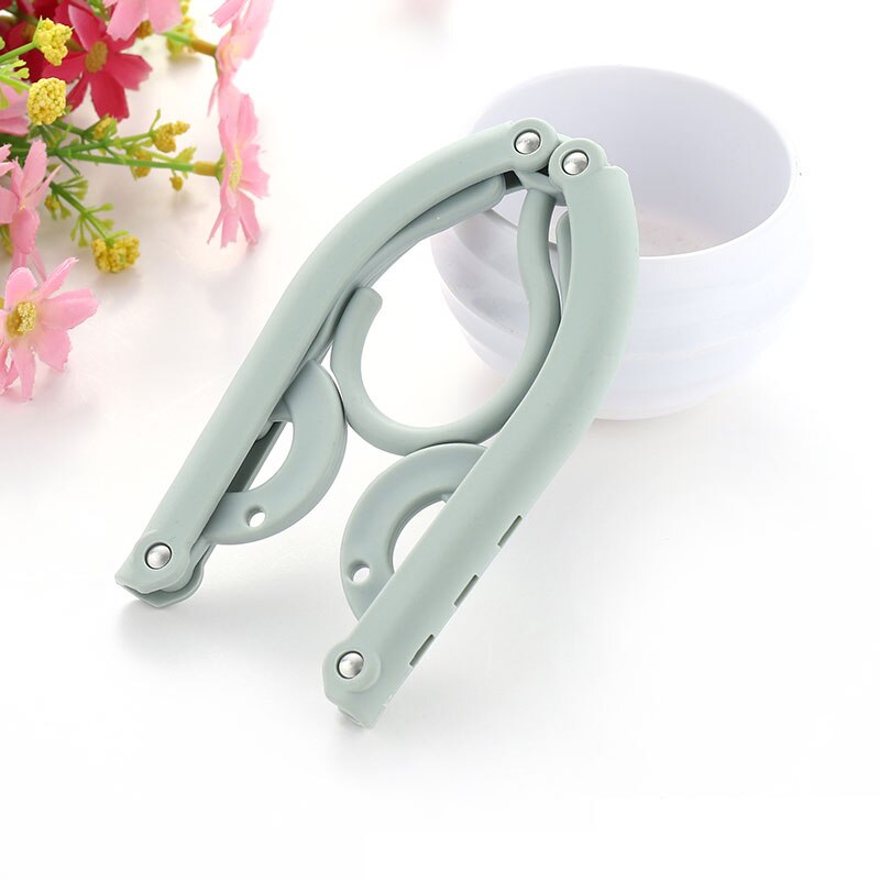 Portable Folding Clothes Hanger Multifunction Magic Stretch Drying Rack Home Wardrobe Storage Rack Women Travel Clothes Hanger: Blue