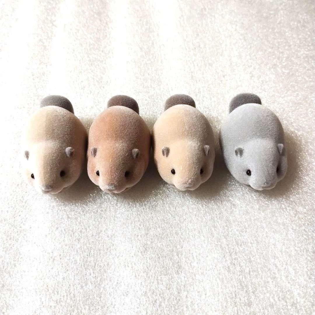 Juguetes de cápsula del mundo graso, figura esponjosa de Nutria kawaii, ojos redondos, boca hinchada, castor gordo flocado, mascota apilable, gashapon