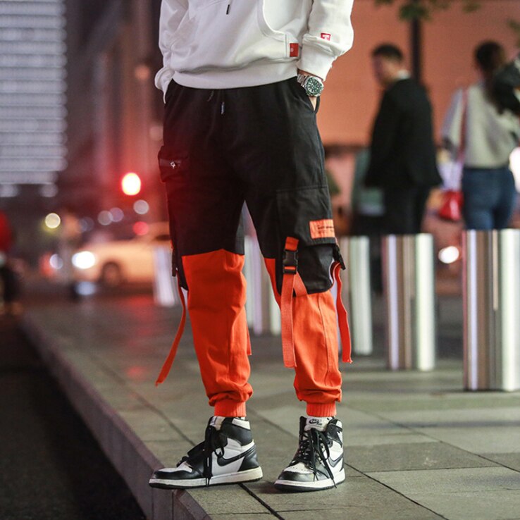 Hombres suelta ropa informal estilo Hip hop coreano pantalones Harem con bolsillo pantalones de tobillo de longitud de remiendo Casual Cargo pantalones de chándal: Naranja / M