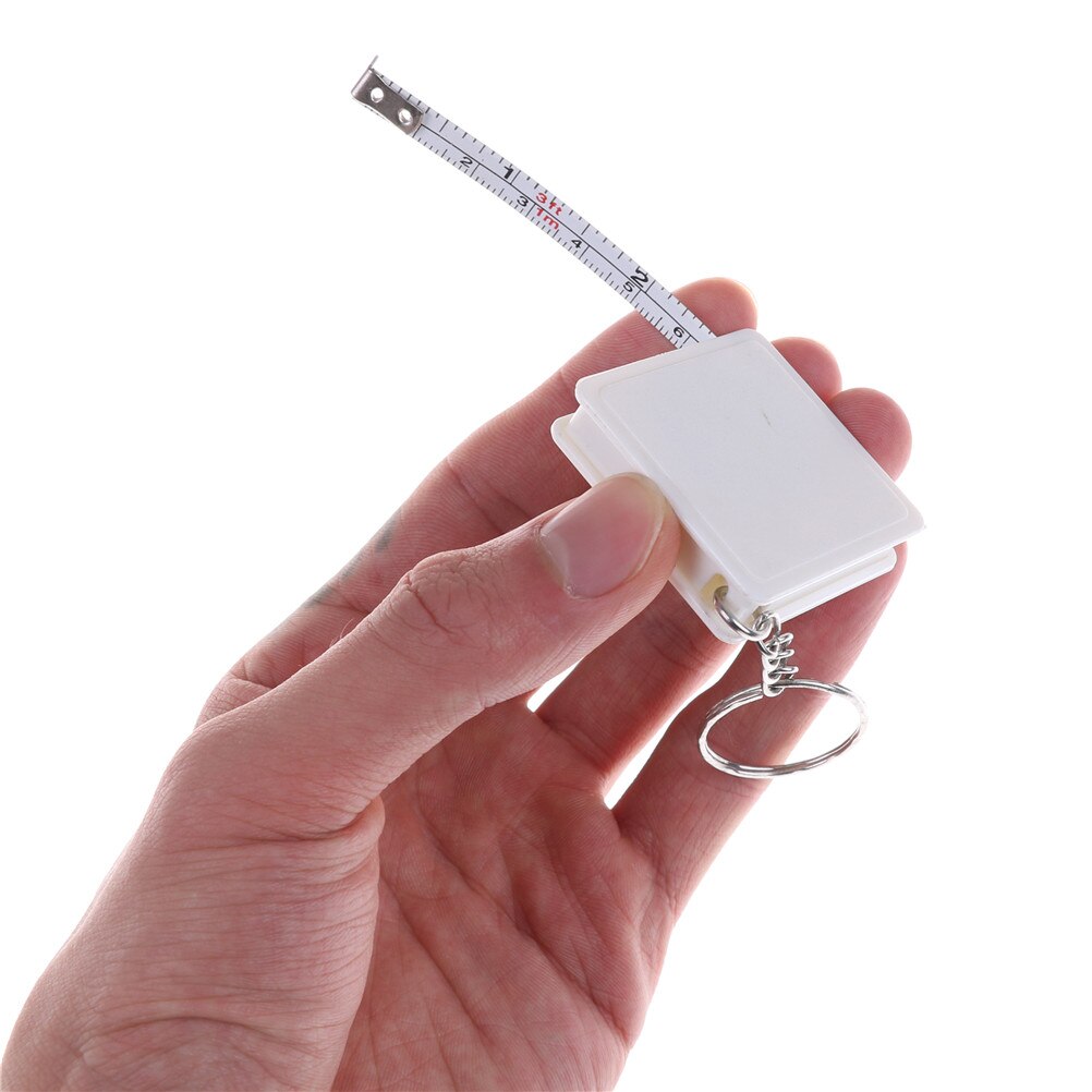 Mini rolmaat met sleutelhanger plastic draagbare intrekbare liniaal centimeter/inch rolmaat 1 meter