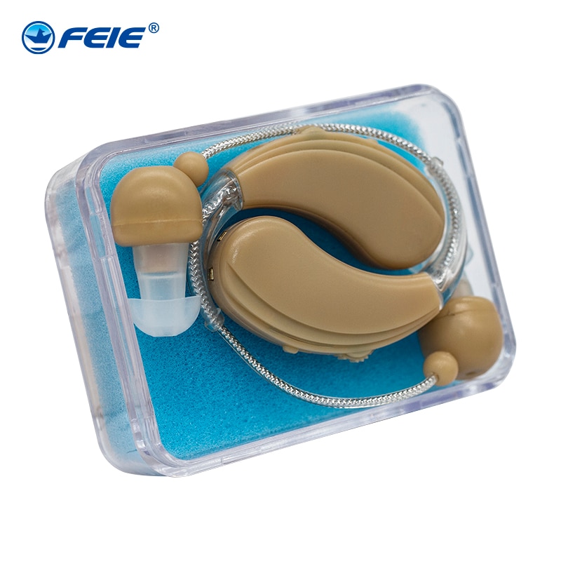 Audífonos recargables auriculares para sordos cargando en ordenador S-109S