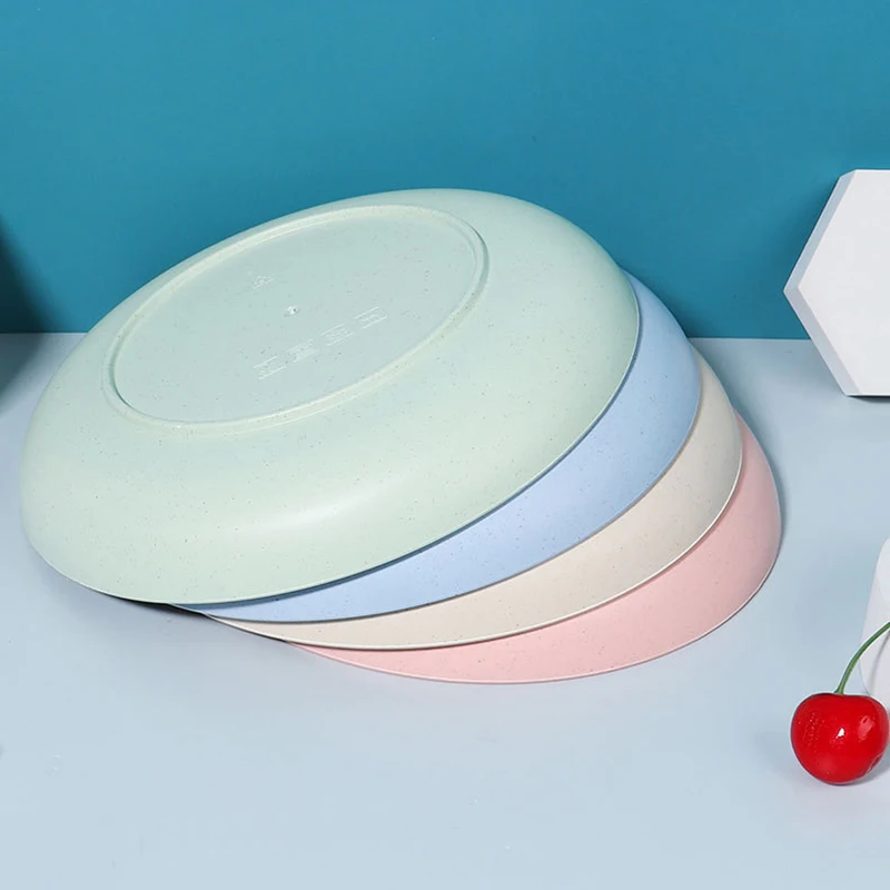 Moderne middagstallerkener til husholdningen, runde køkkentallerkener af hvetestrå i plastik til mad, sauce, fad, smagsbræt, snacks og frugt