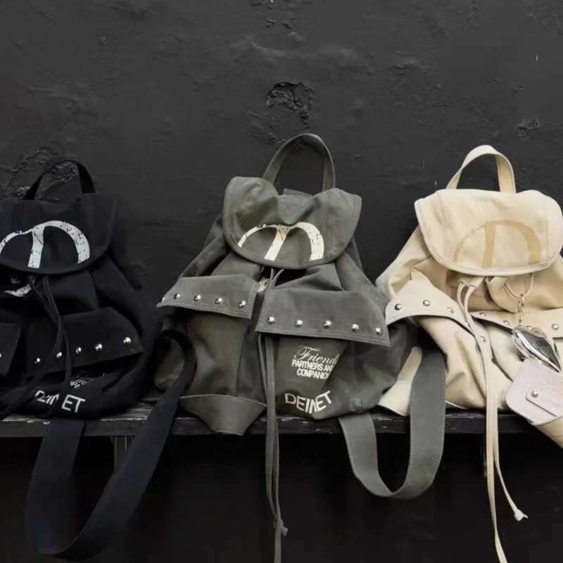 Mochila con cordón de lona con remaches para hombre y mujer, bolso decorativo de gran capacidad, sencillo, informal, Unisex, Y2k, con dos bolsillos