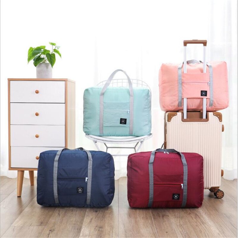 Borsa da viaggio pieghevole in Nylon Unisex borsa impermeabile di grande capacità per bagagli da donna borse da viaggio pieghevoli Organizer cubi da imballaggio